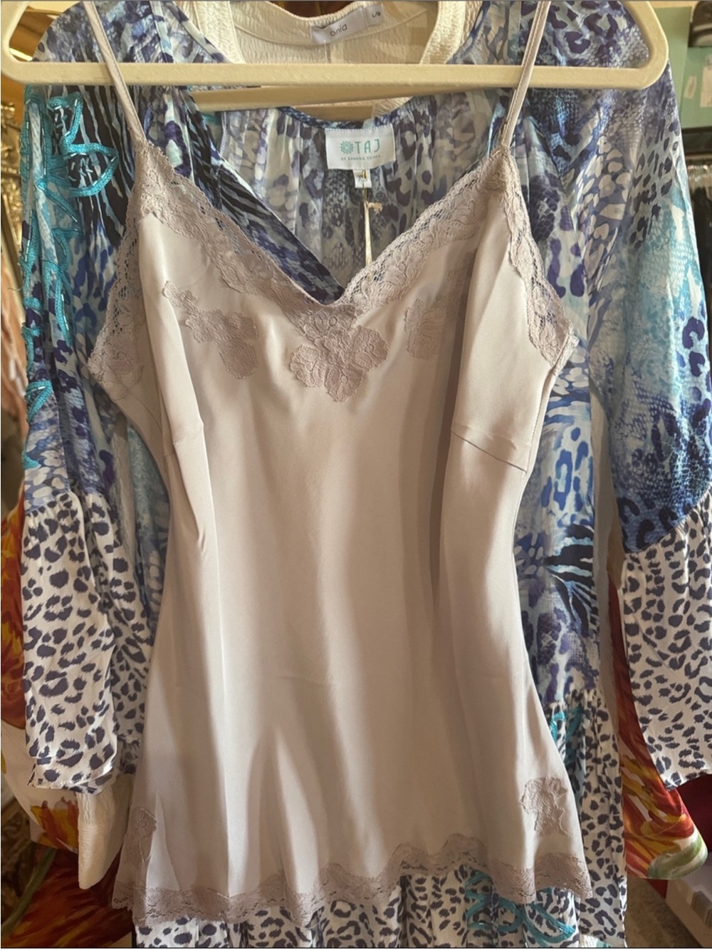 Gold Hawk
Gold Hawk Silver Grey Washable Silk Camisole NWT, $200MSRP
$89. $200